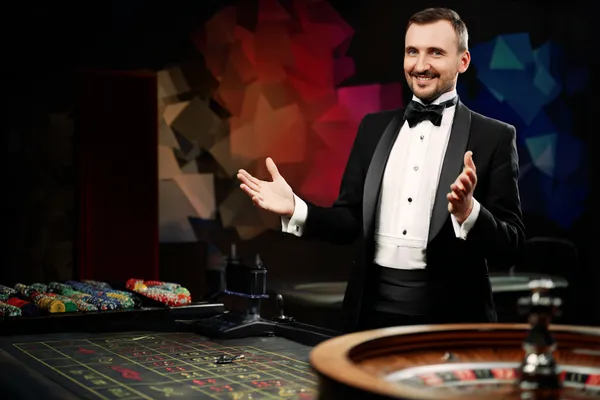 A glowing roulette wheel with cascading chips, symbolizing the engaging live and instant-win games available on 778G0.
