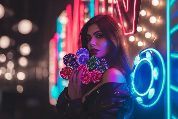 A woman in a luxurious green gown next to an ornate roulette wheel, capturing the upscale casino mood of 778G0.