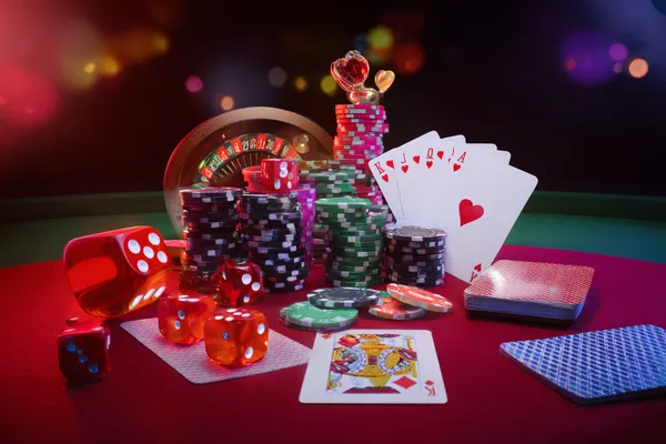 A player using their smartphone during a festive local event, representing 778G0’s fully mobile-friendly casino.