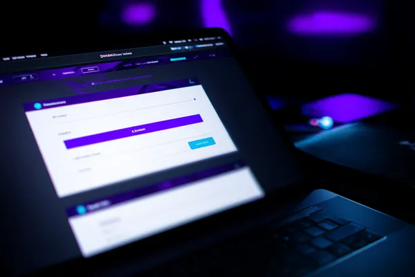 A confident dealer surrounded by casino chips inviting players to access their 778G0 account, reflecting quick and easy login options.