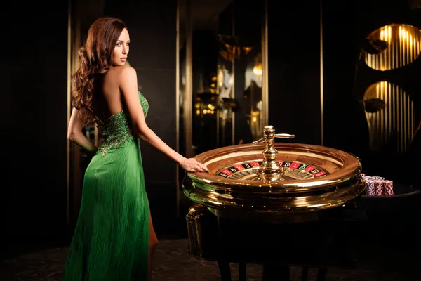 A person using their device against a moody casino-themed background, illustrating the smooth re-entry process at 778G0.